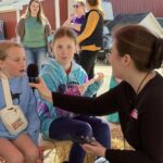 Girl Scouts Earn Dairy Patch & Learn Farm Radio